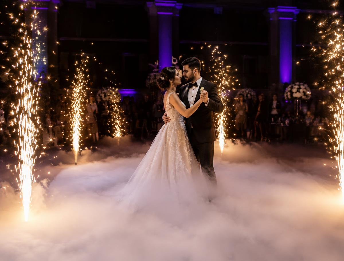 Couple dancing on a cloud with cold sparks